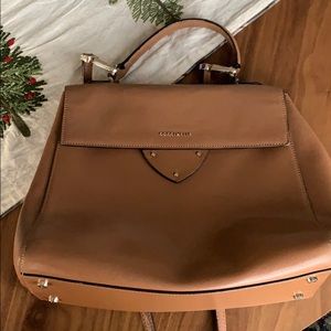 Brown leather Coccinelle purse purchased in Italy